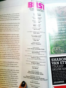 Brittany points to her name in the Masthead