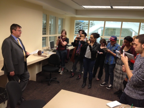 SUNY Purchase Journalism Professor, Ross Daly, faking it for a smartphone presser